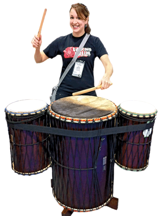 Mama Djun on stand, with Sangban (L) and Kenkeni (R)